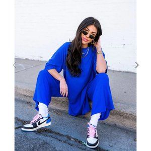 Dressed in Lala playsuit. NWOT Size L